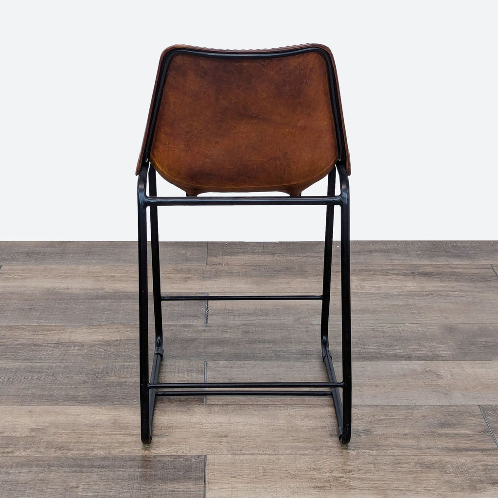 a pair of bar stools by [ unused0 ].