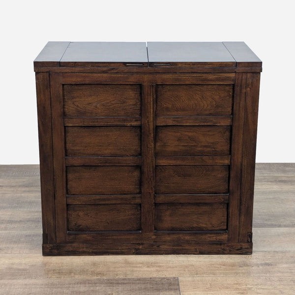 a large oak cabinet with a glass top.