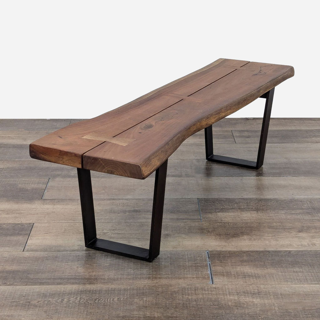 the bench is made from a solid walnut wood.