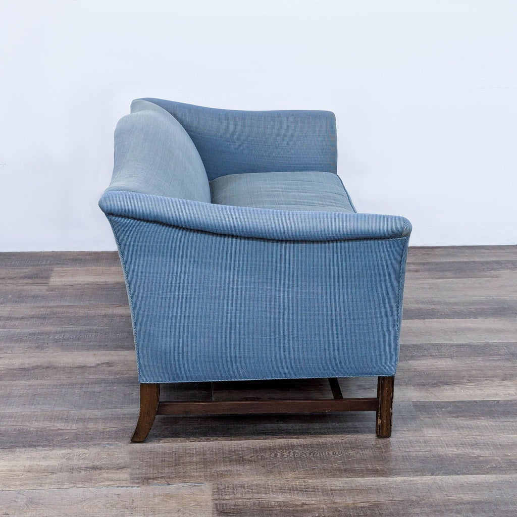 a pair of french blue upholstered chairs