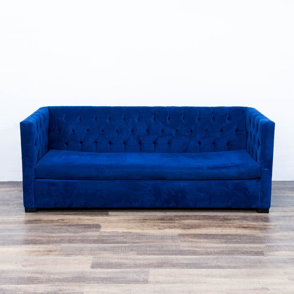 the [ unused0 ] sofa in deep blue velvet