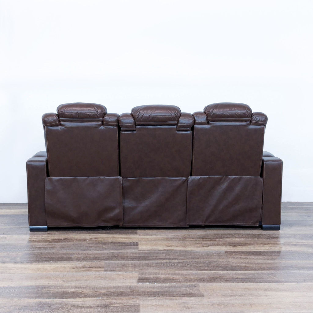 The Man-Den Triple Power Leather Reclining Sofa By Ashley Furniture