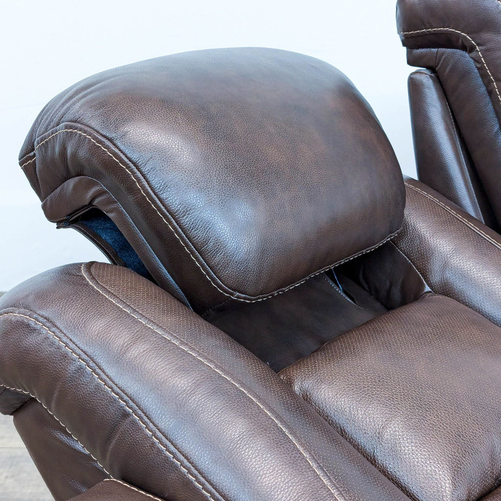 The Man-Den Triple Power Leather Reclining Sofa By Ashley Furniture