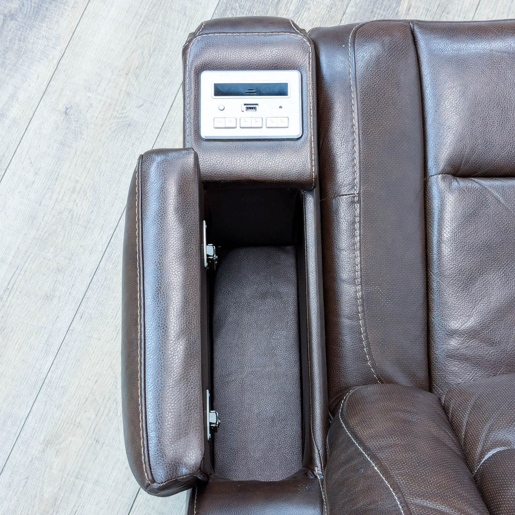 The Man-Den Triple Power Leather Reclining Sofa By Ashley Furniture