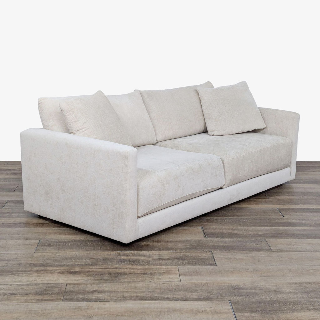 sofa with a modern design. the sofa is made of a soft fabric with a soft, comfortable