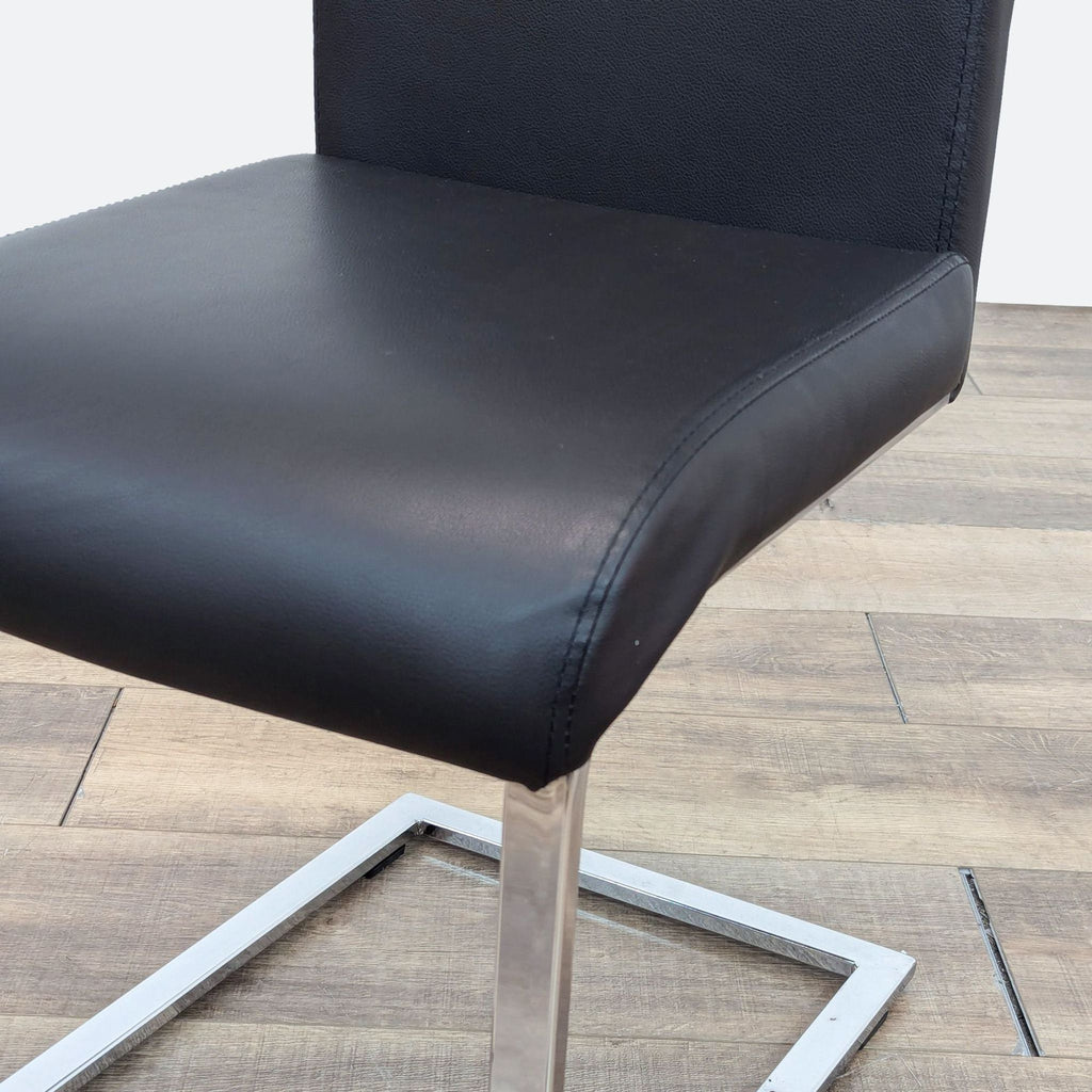 Modern Black Faux Leather Dining Chair with Chrome Base