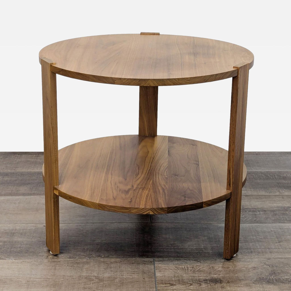 the round coffee table is made from solid walnut and has a round top and a round top.