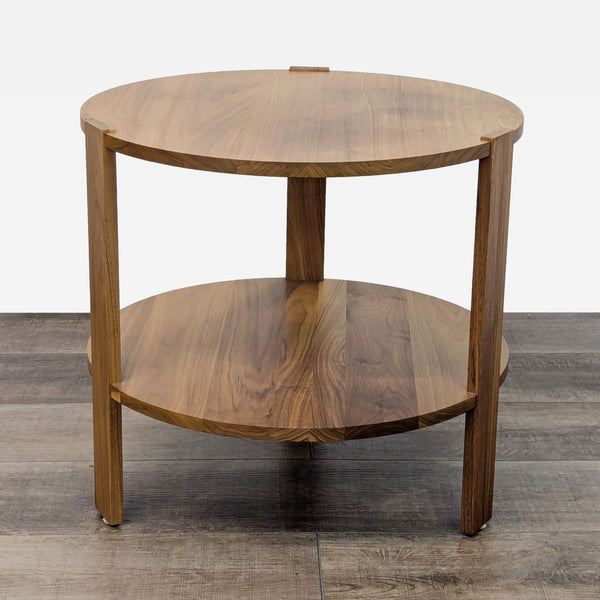 the round coffee table is made from solid walnut and has a round top and a round top.