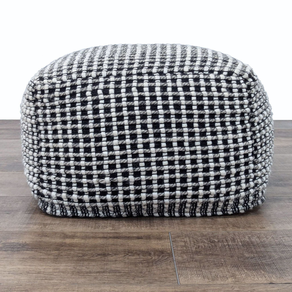 Article Black And White Upholstered Ren Pouf