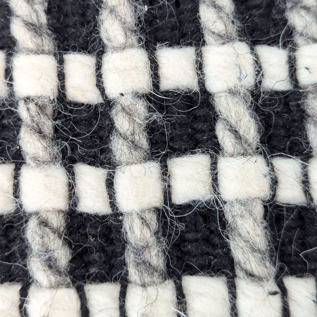 close up of a black and white checkered fabric