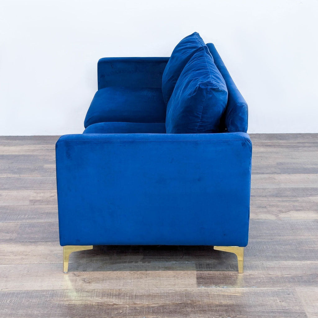 Blue Velvet Loveseat with Metal Feet in a Gold Finish