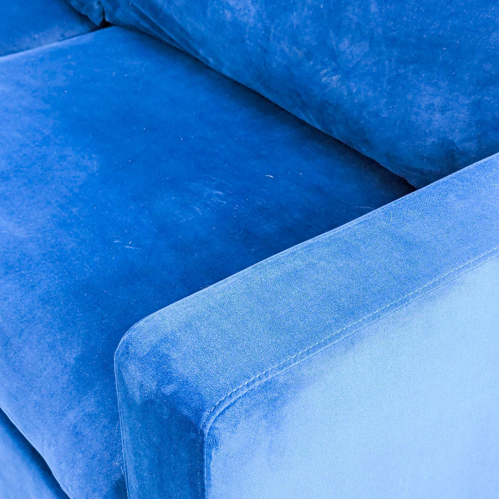 Blue Velvet Loveseat with Metal Feet in a Gold Finish