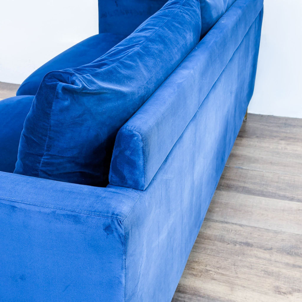 Blue Velvet Loveseat with Metal Feet in a Gold Finish