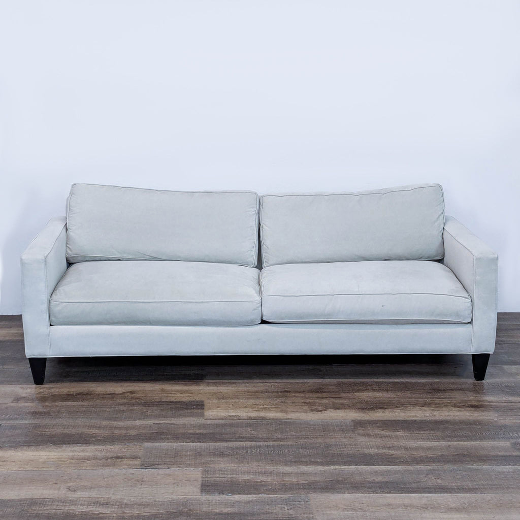 sofa is a modern sofa that is made of soft cotton fabric. the sofa is made of soft