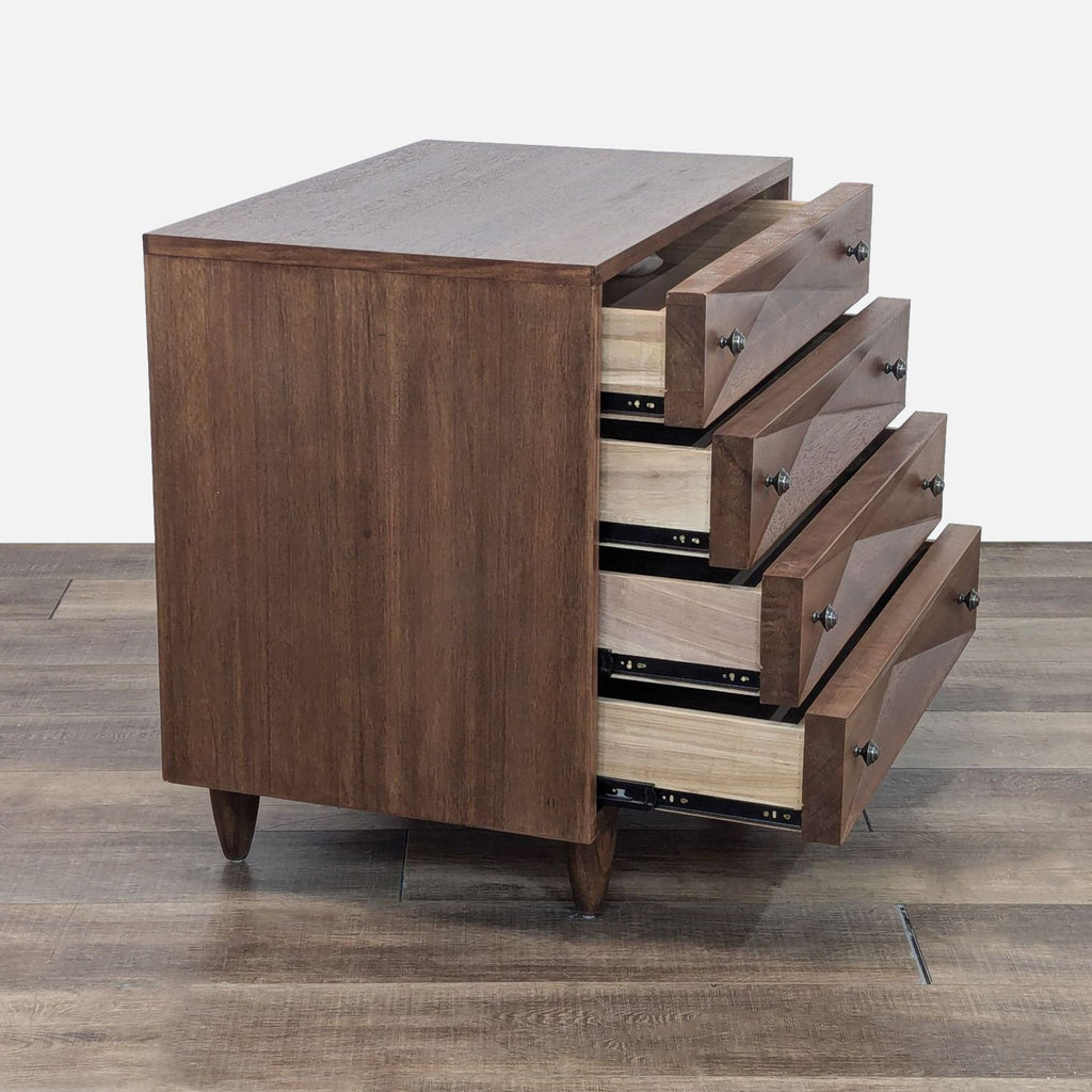 a walnut and walnut chest of drawers.