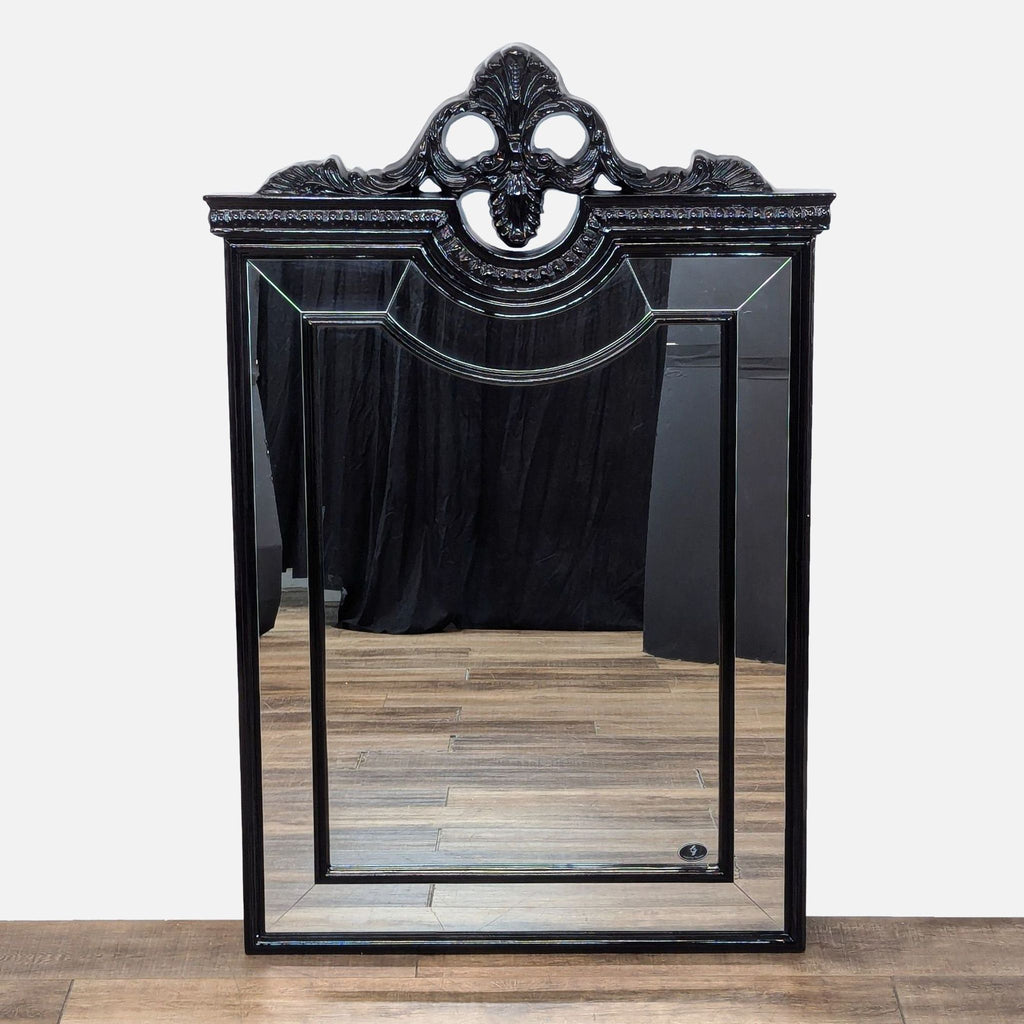 a gothic mirror with a gothic frame.