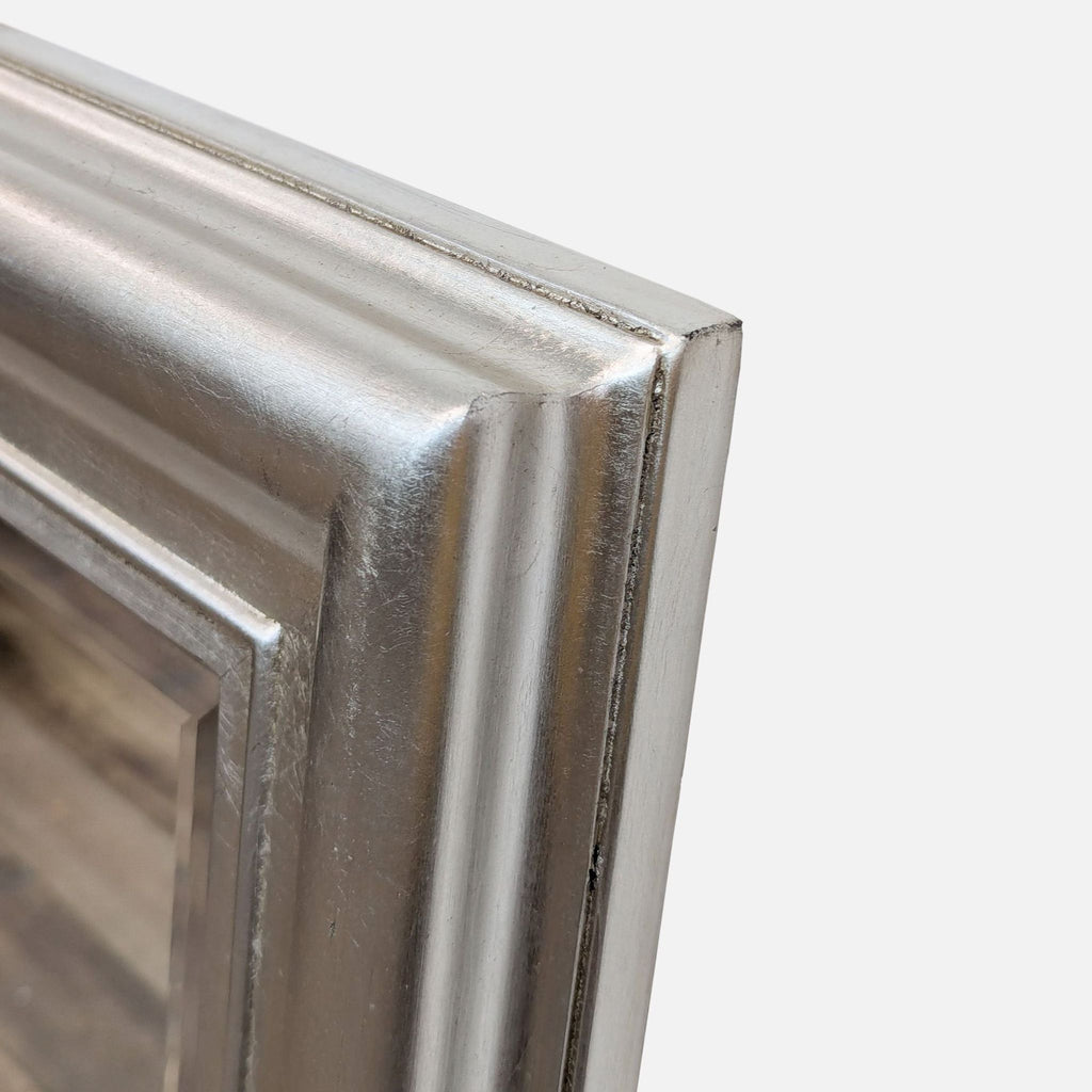 a metal frame with a metal finish