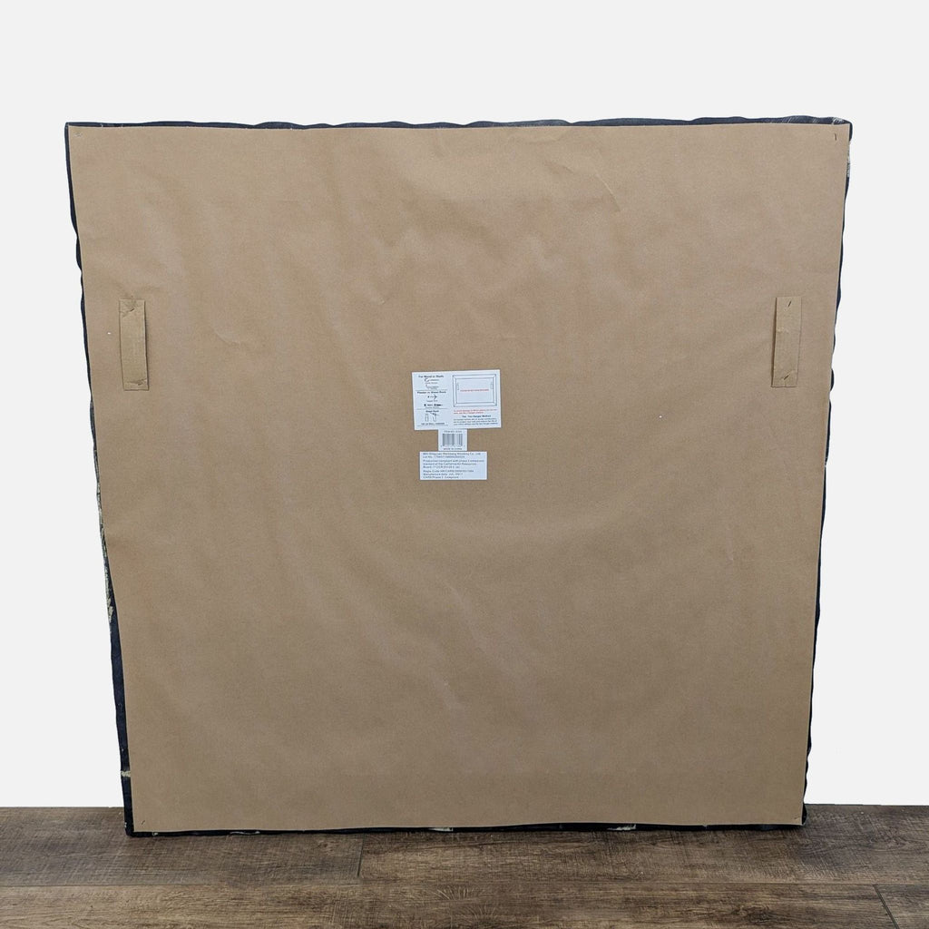 a large size cardboard box with a label on the front.