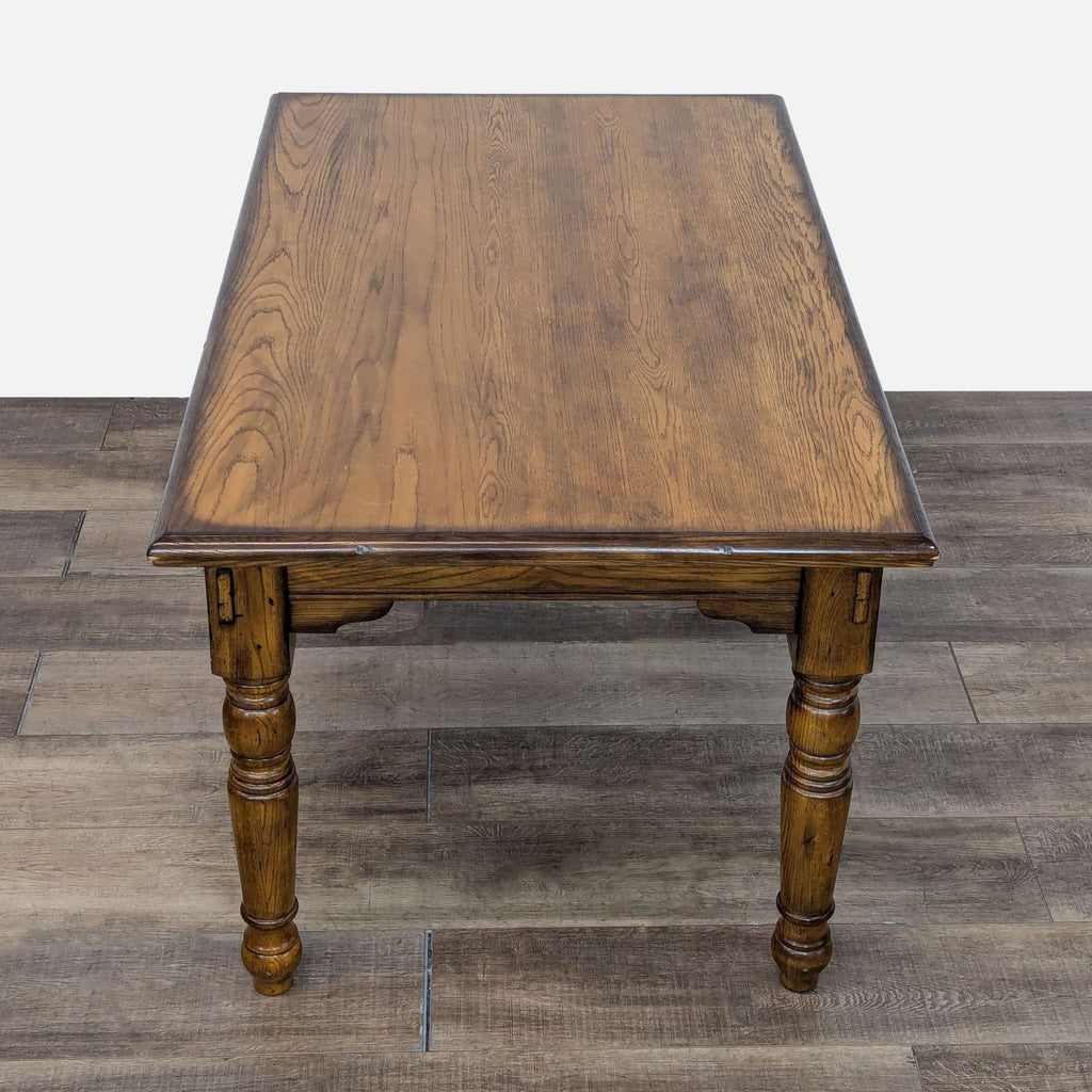 a vintage farmhouse style dining table with a walnut top and a walnut top.