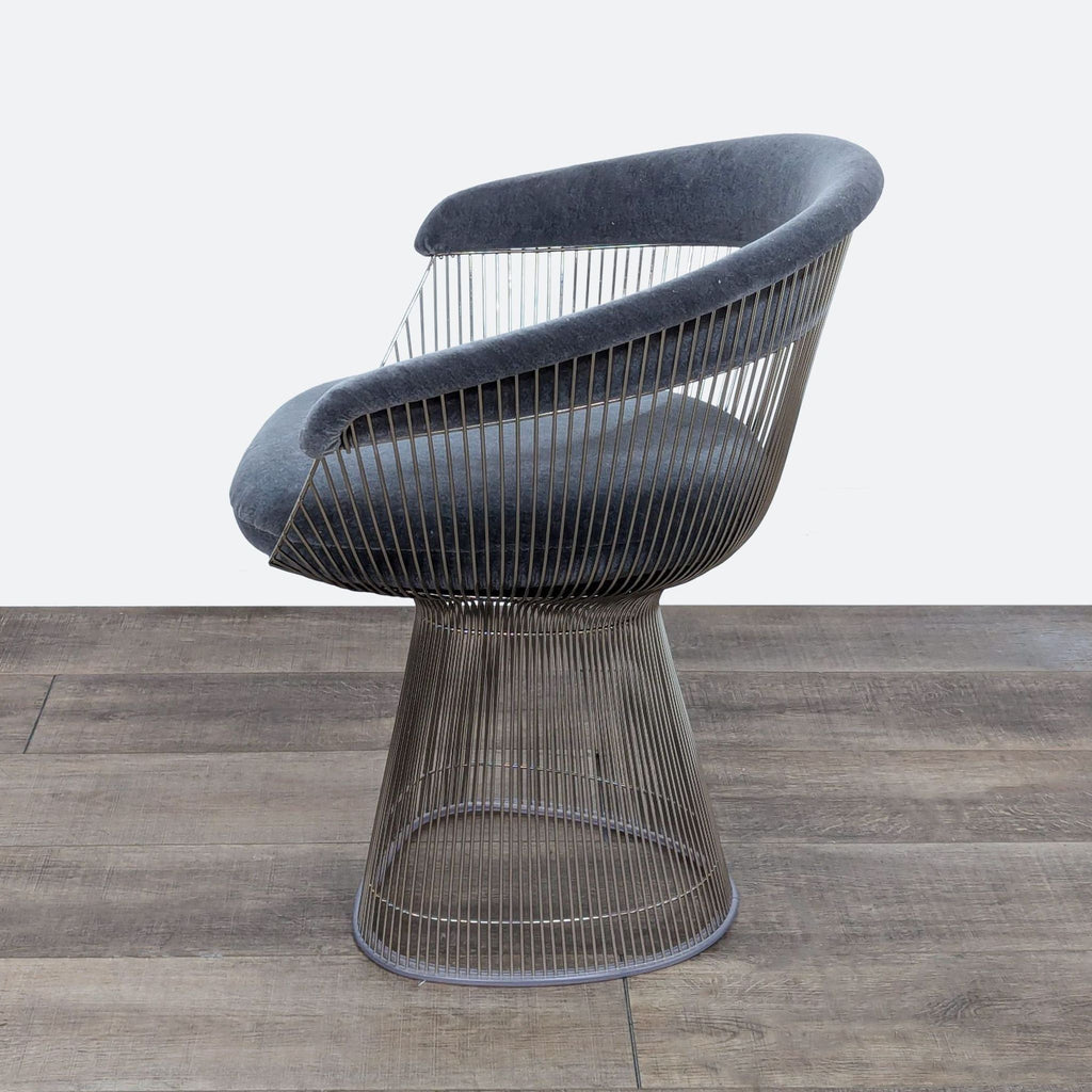 the chair is made of a steel mesh.