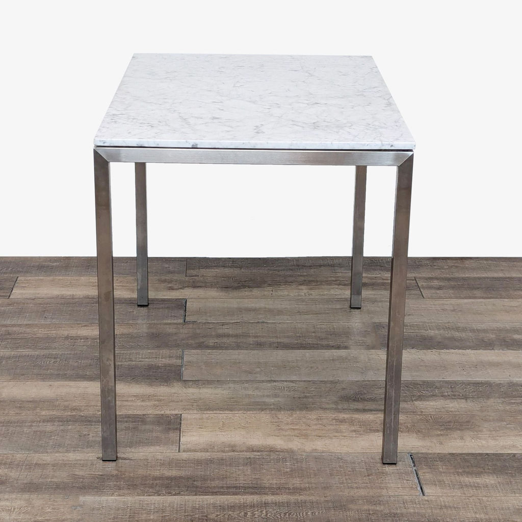 a marble table with a square top and a square top.