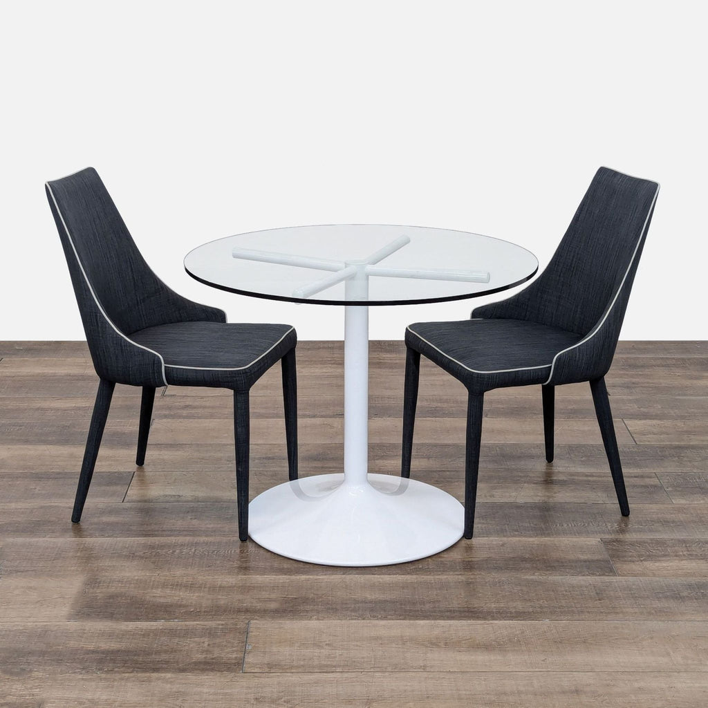 the [ unused0 ] dining table with glass top and black chairs