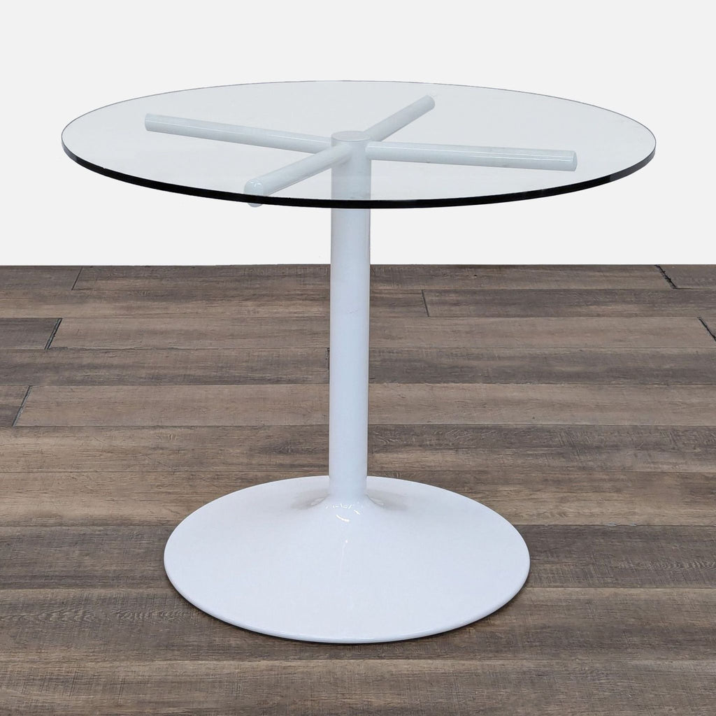 a white glass coffee table with a white glass top.