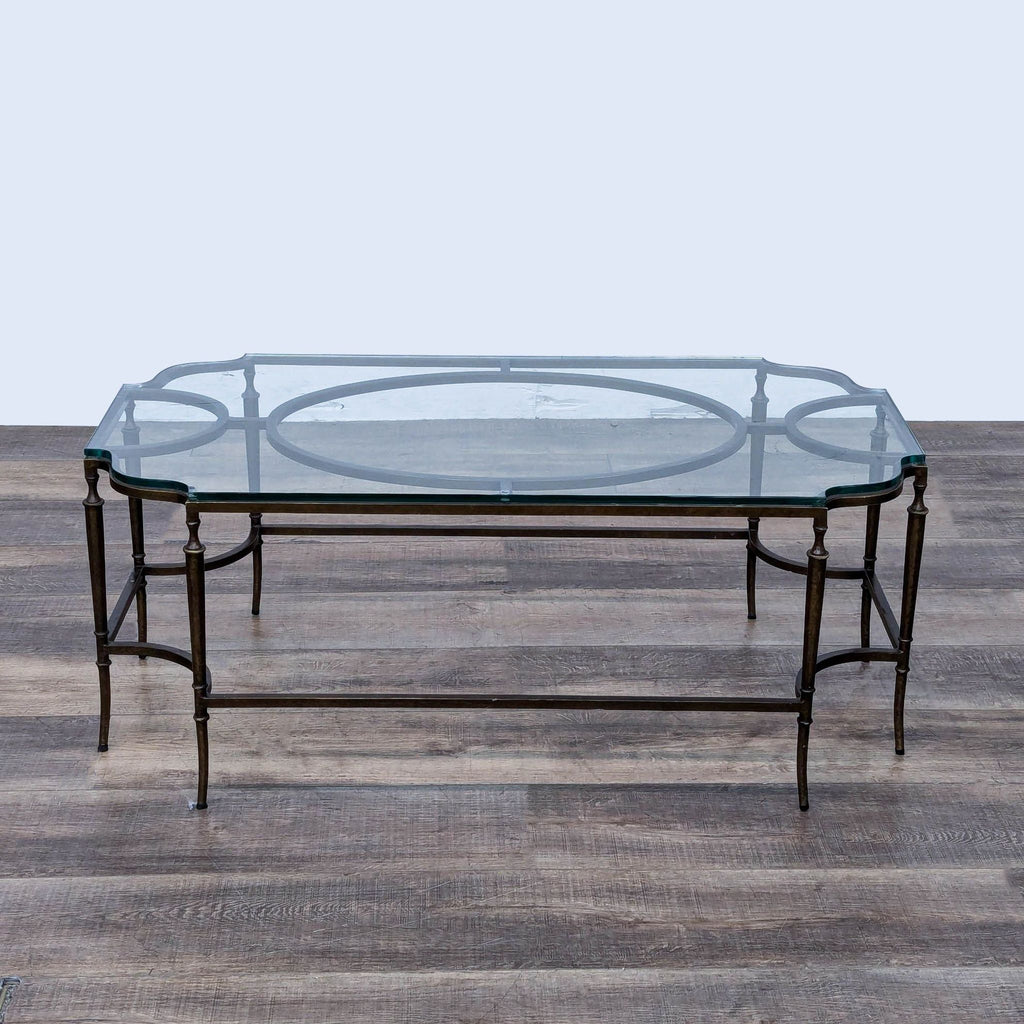 a vintage french brass and glass coffee table