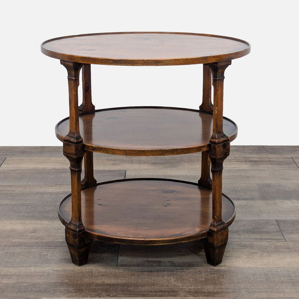 a three tiered round table with three tiers of wood.