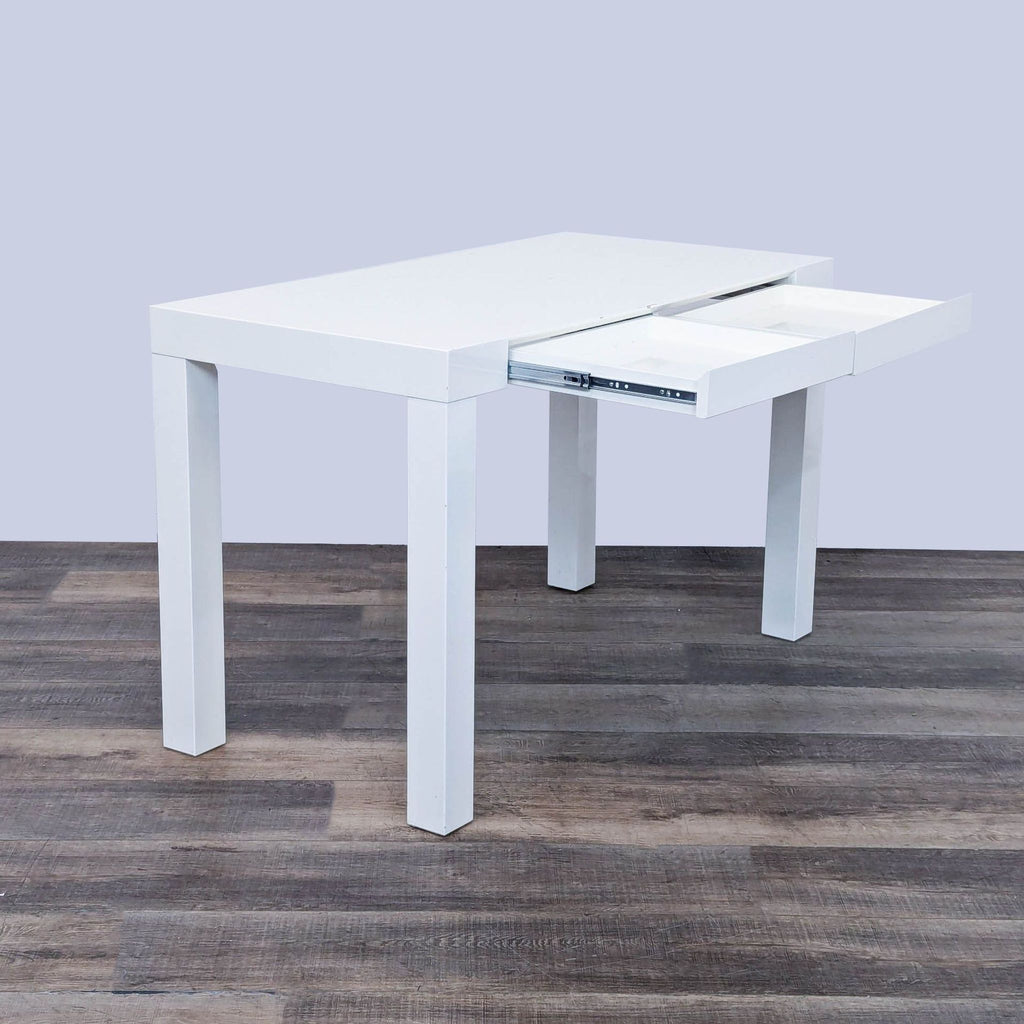 the square white table with a fold out table