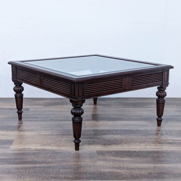 a [ unused0 ] coffee table with glass top