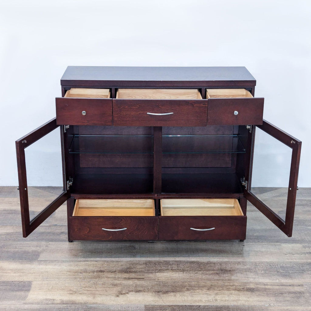 Sideboard with open glass doors, showing spacious glass shelves and drawers.