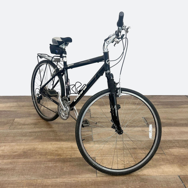 a bike on a wooden floor