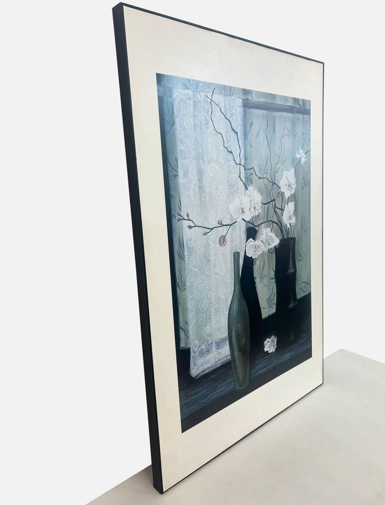 framed print of a vase with flowers