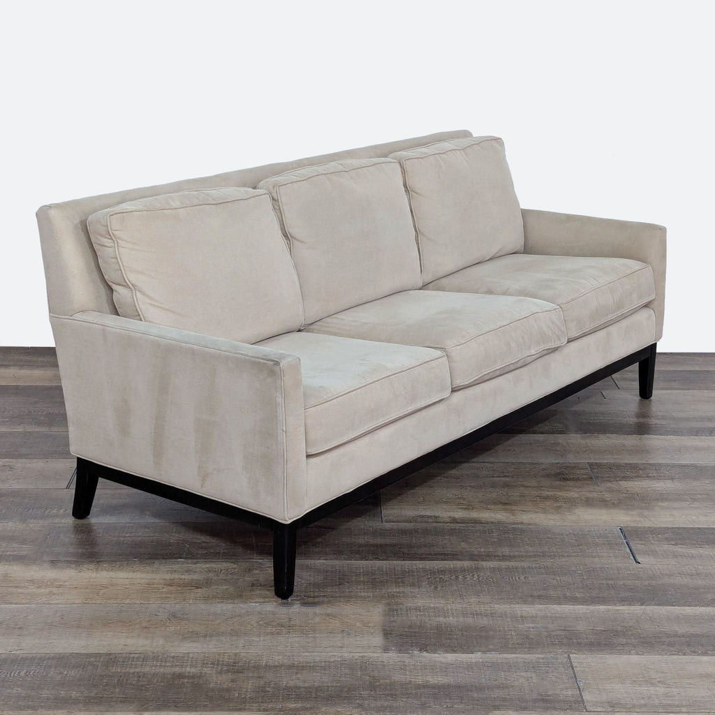 sofa is a modern, contemporary design that is made of soft grey fabric. the sofa is made