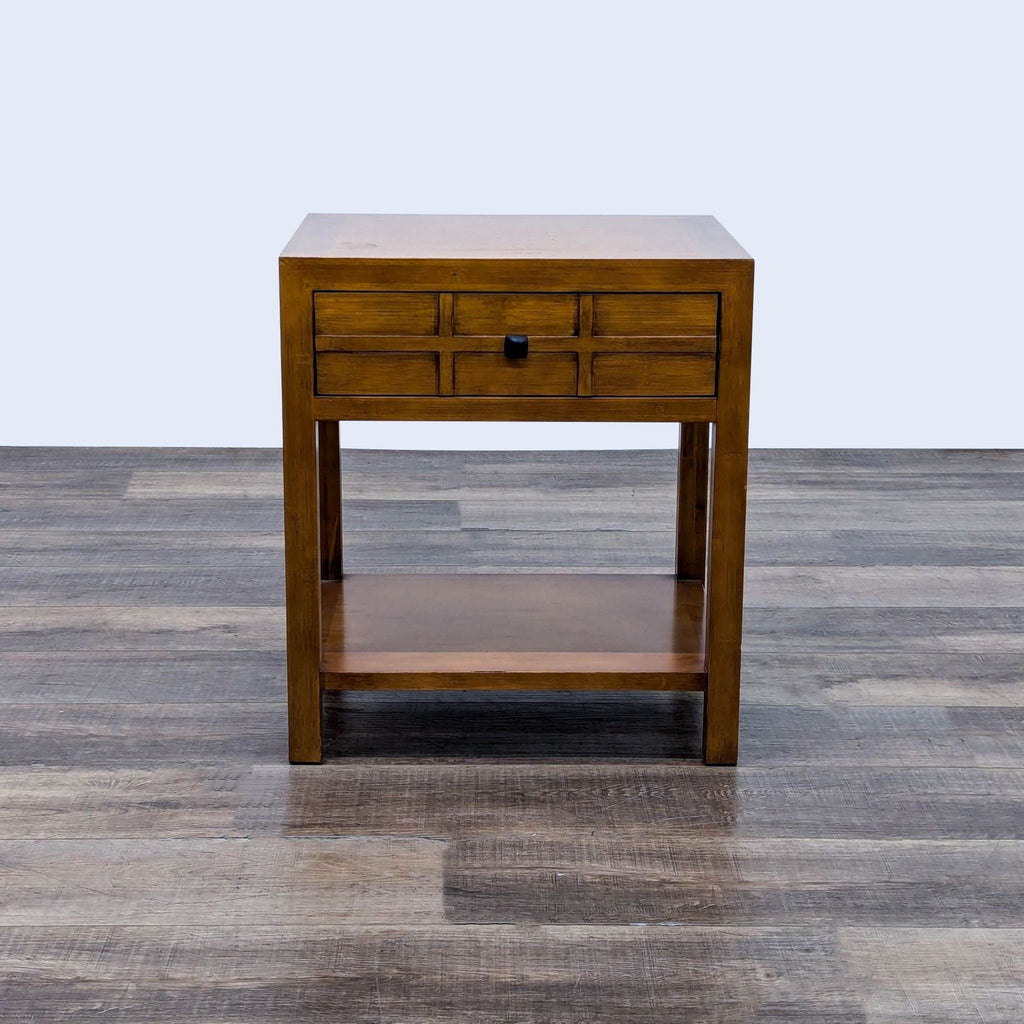 a mid century modern walnut bedside table