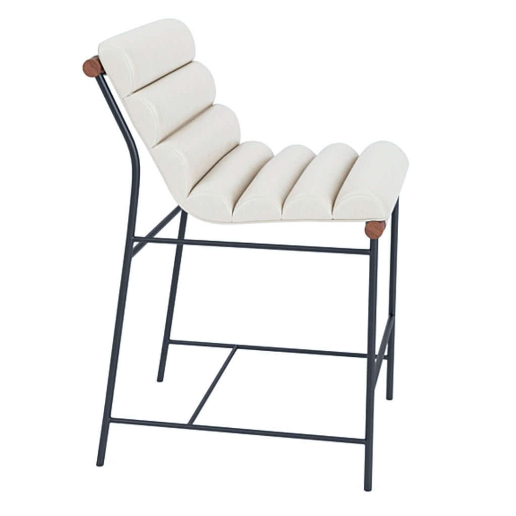 the modern outdoor chair is made of steel and has a white leather seat and back.