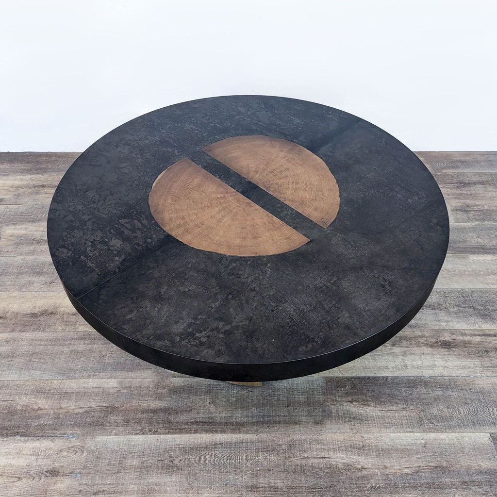 a round coffee table with a circular wooden top.