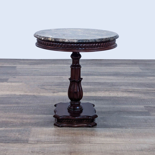 antique french round table with a carved wood base