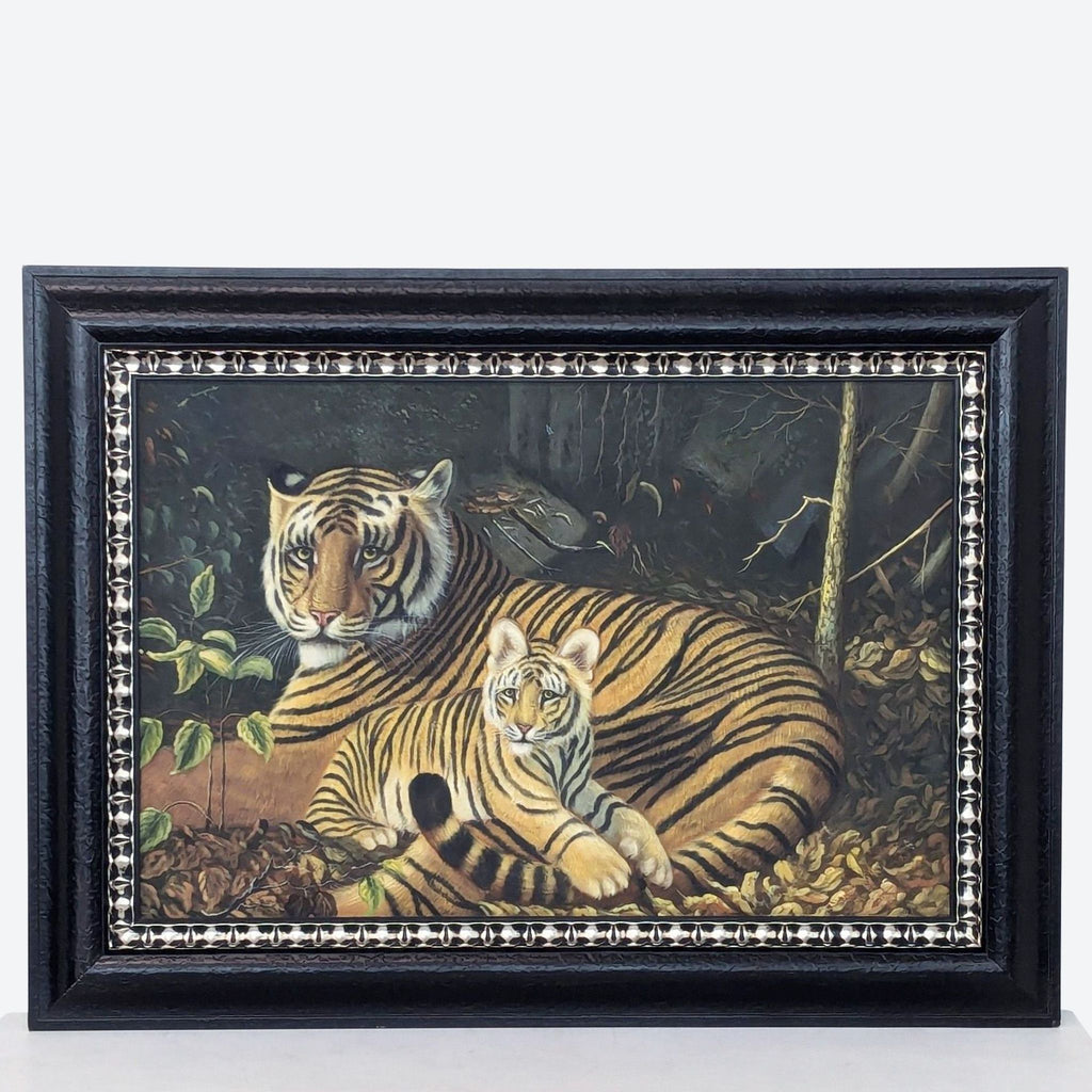 a framed painting of a tiger and her cub