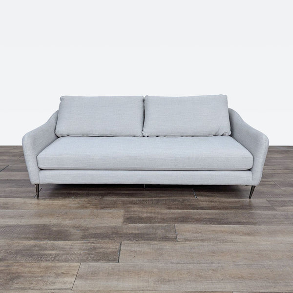 sofa is a modern sofa that is made of soft grey fabric. the sofa is made of soft