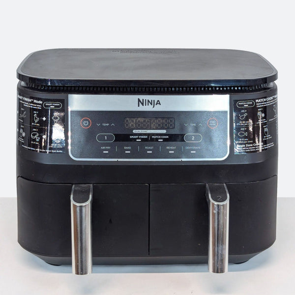 a black and silver hi - fi radio with a white background.