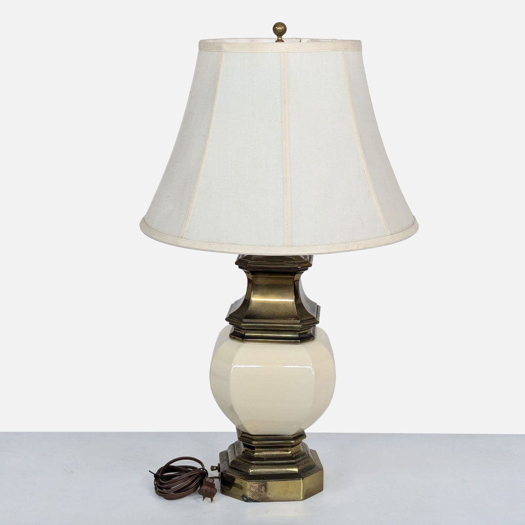 a vintage lamp with a white glass shade.