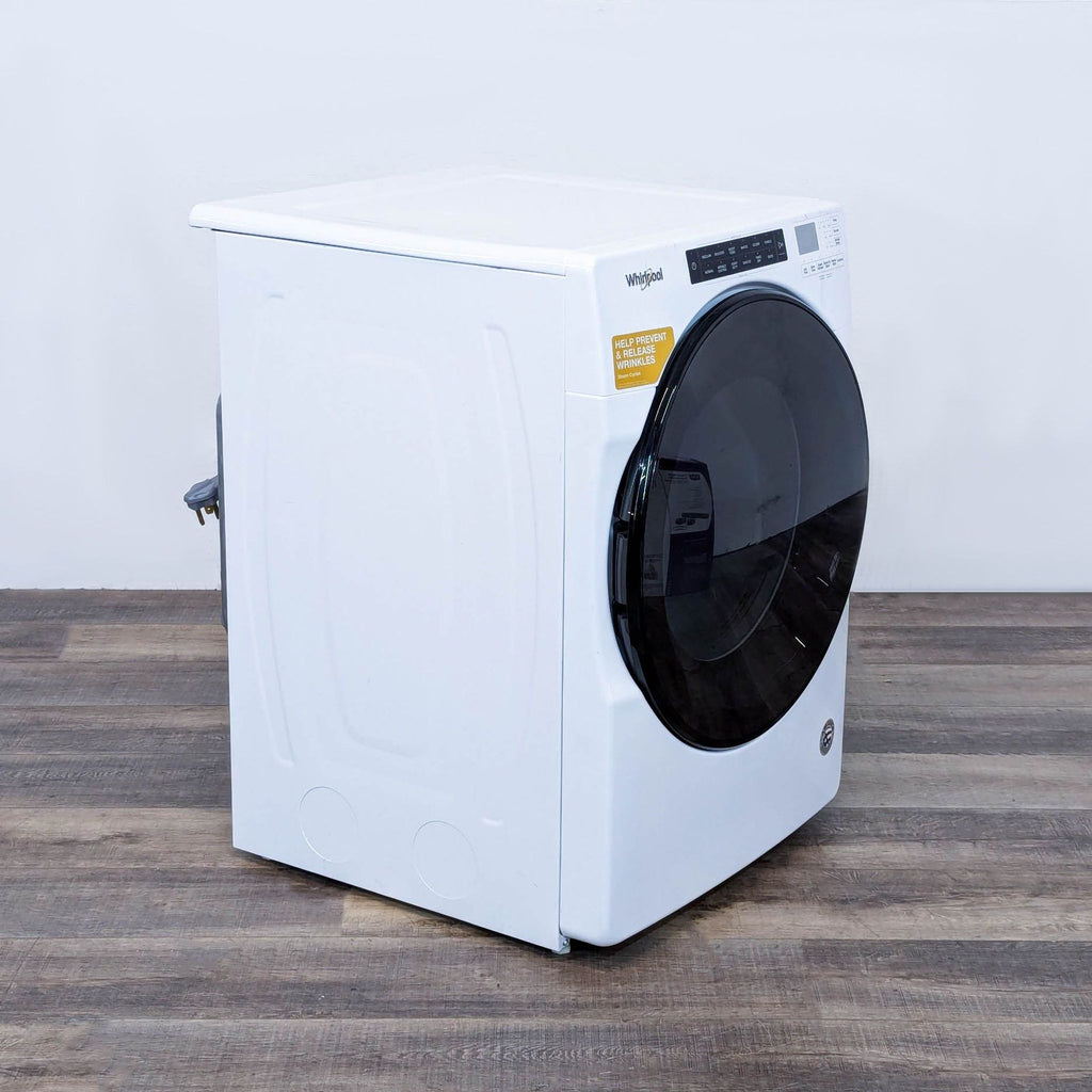 the washing machine is a compact, compact, compact, and compact.