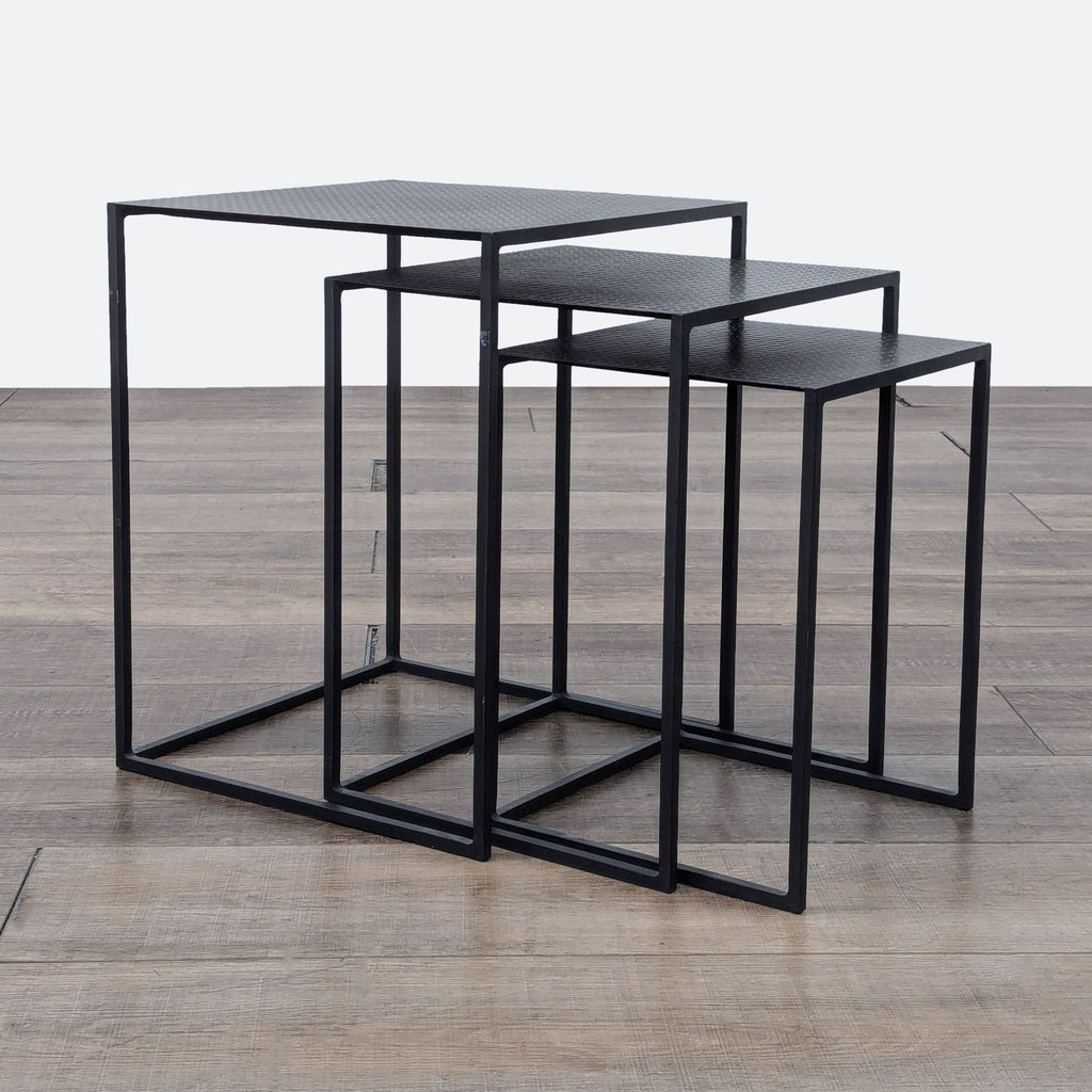 the table is a modern design that is made from metal and has a black frame.