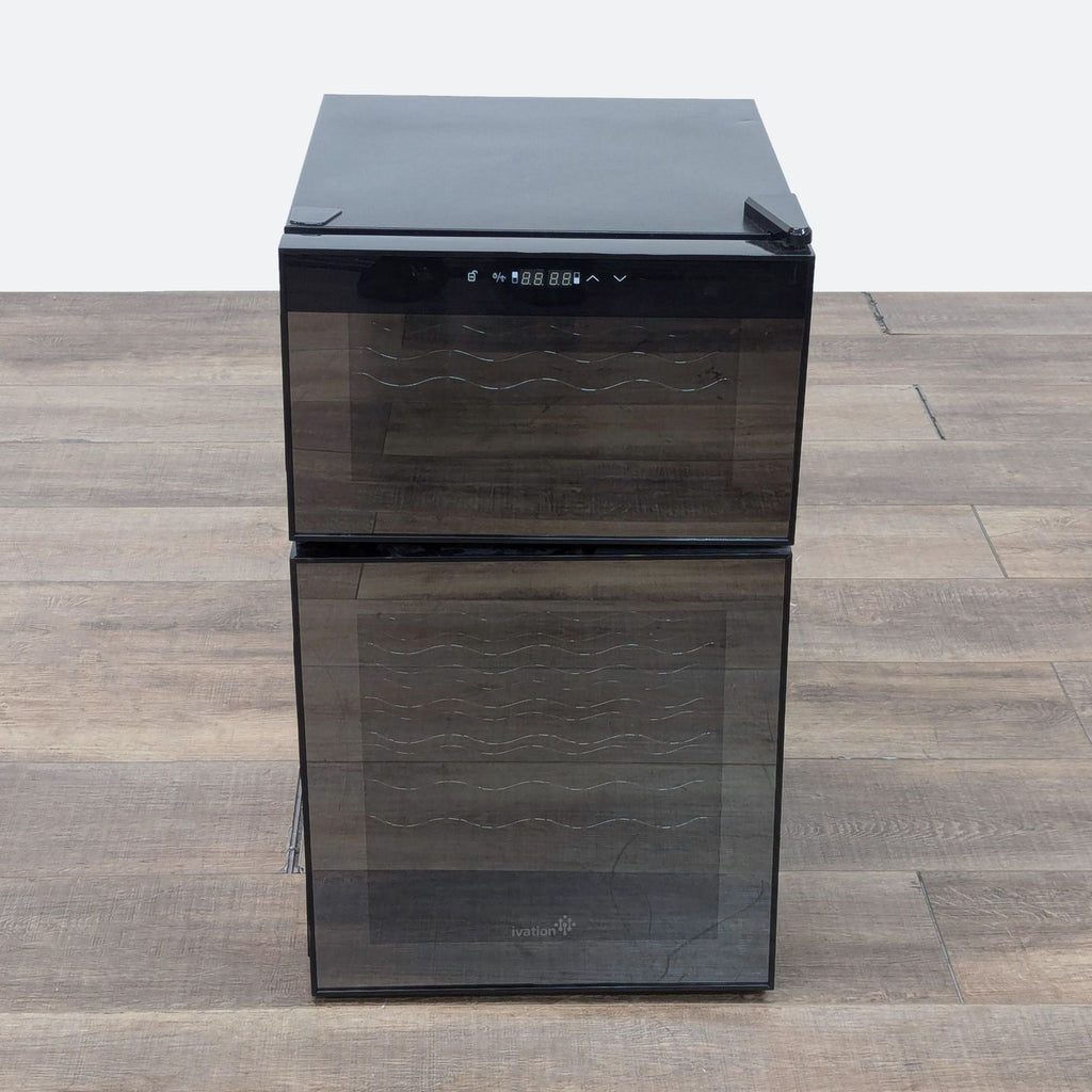 a black glass box on a wooden floor.