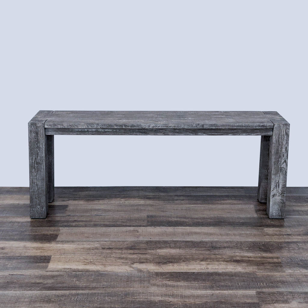 the [ unused0 ] bench is made of concrete and has a natural wood finish.