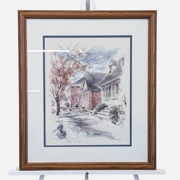 a framed watercolor painting of a house