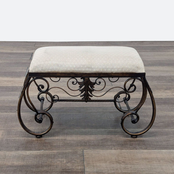 a pair of antique wrought iron bench seats.