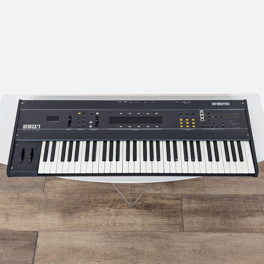 a vintage yamaha synthesizer sitting on a wooden floor.